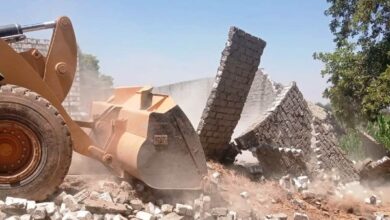 إزالة التعديات على أراضى الدولة ضمن المرحلة الثالثة بالموجة الـ26 بمركزى أسوان ودراو